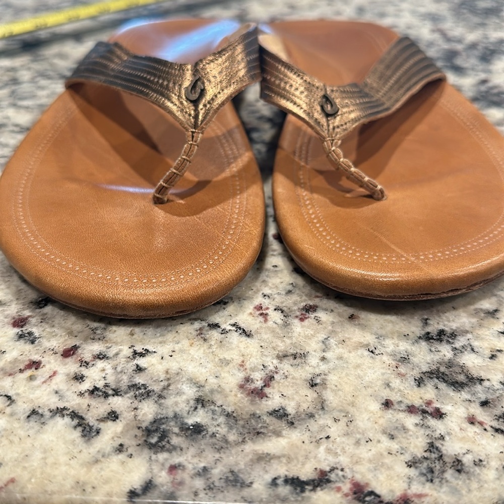 OluKai Women's Brown Leather Flip Flop Sandals with Metallic Bronze Straps - Picture 5 of 6